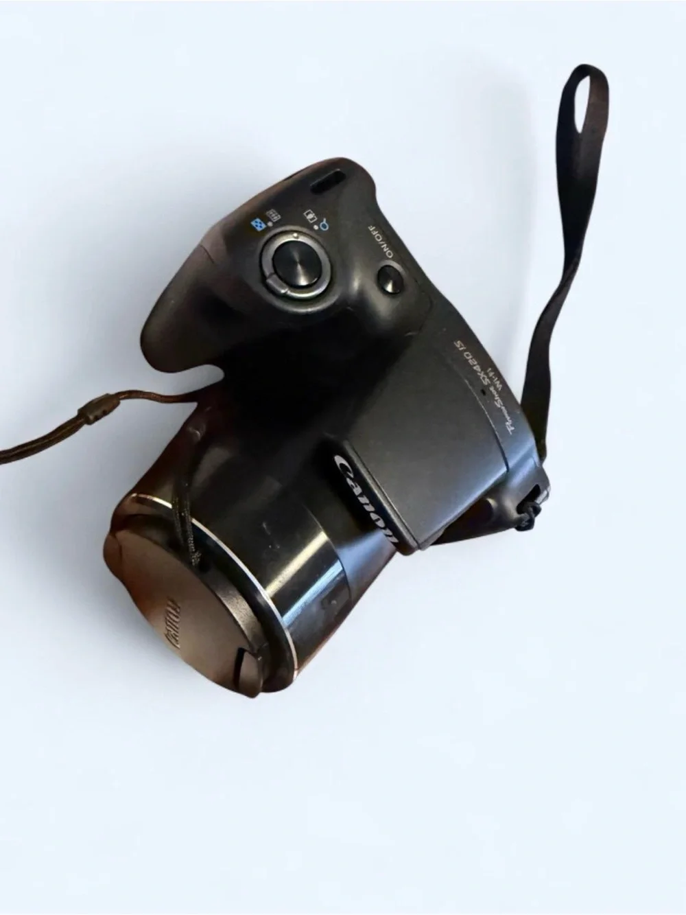 Canon PowerShot SX420 IS Digital Camera with Lens Cover, wrist wrap, and battery